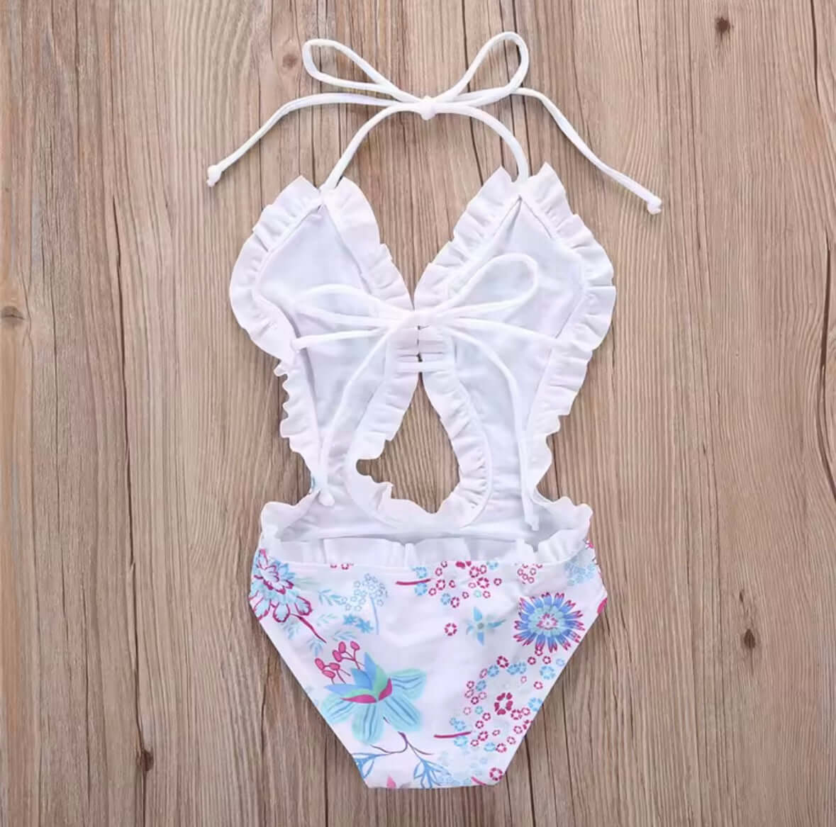 Girls’ Floral One-Piece Swimsuit with Ruffle Trim – Cutout & Halter Neck