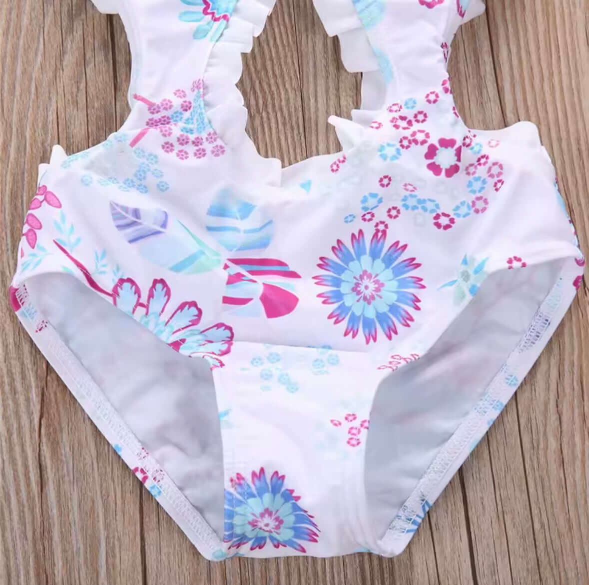 Girls’ Floral One-Piece Swimsuit with Ruffle Trim – Cutout & Halter Neck