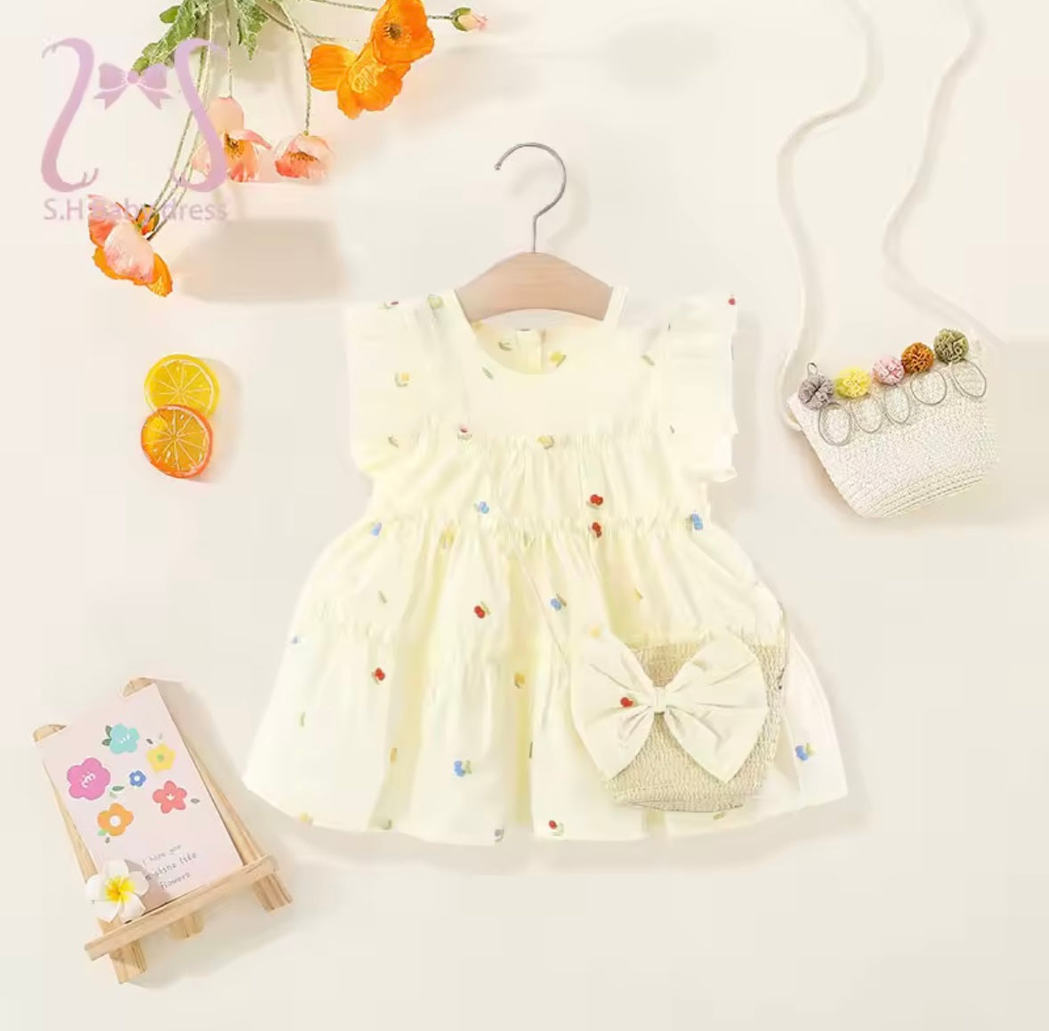Butterfly Garden Ruffle Baby Dress – Soft Yellow with Mini Florals + Matching Bow Bag