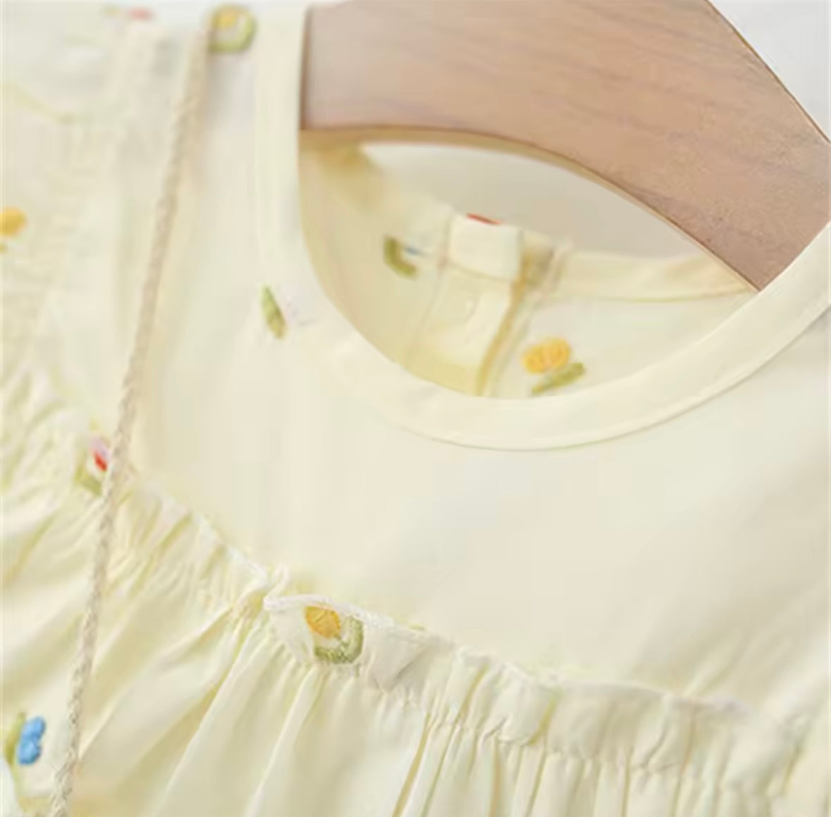 Butterfly Garden Ruffle Baby Dress – Soft Yellow with Mini Florals + Matching Bow Bag