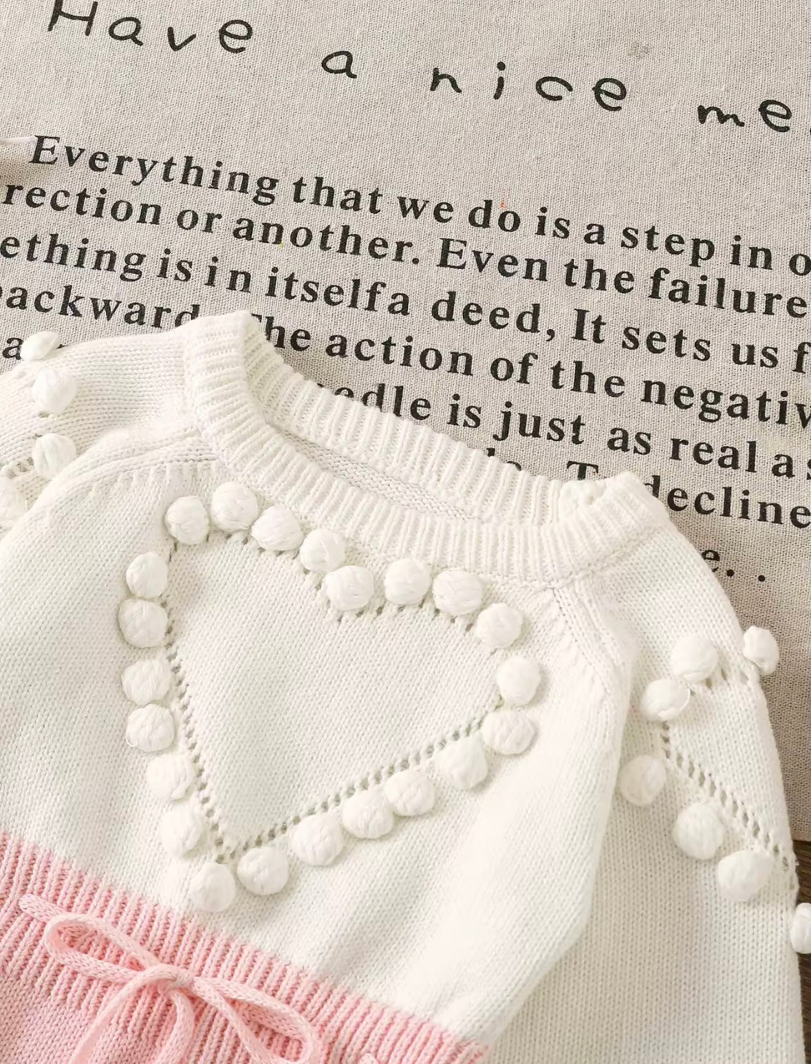 Knitted Baby Romper with Heart Detail – Long Sleeve Pink & White Bodysuit. Size 0-3M and 3-6M available