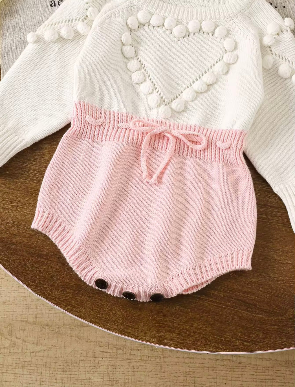 Knitted Baby Romper with Heart Detail – Long Sleeve Pink & White Bodysuit. Size 0-3M and 3-6M available