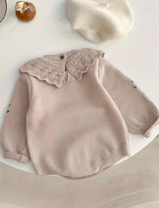 Embroidered Knit Baby Romper – Vintage DARK Beige with Floral Details. Available in sizes 3-6m and 6-9m.