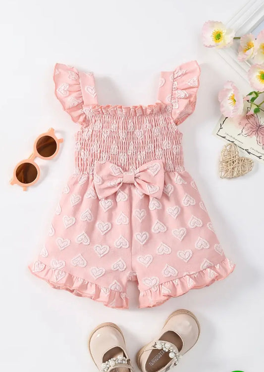 Adorable Pink Heart-Patterned Girls' Romper with Bow Detail