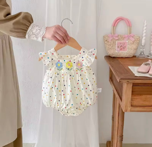 Rainbow Dot Ruffle Romper – Baby Girl One-Piece with Floral Appliqué