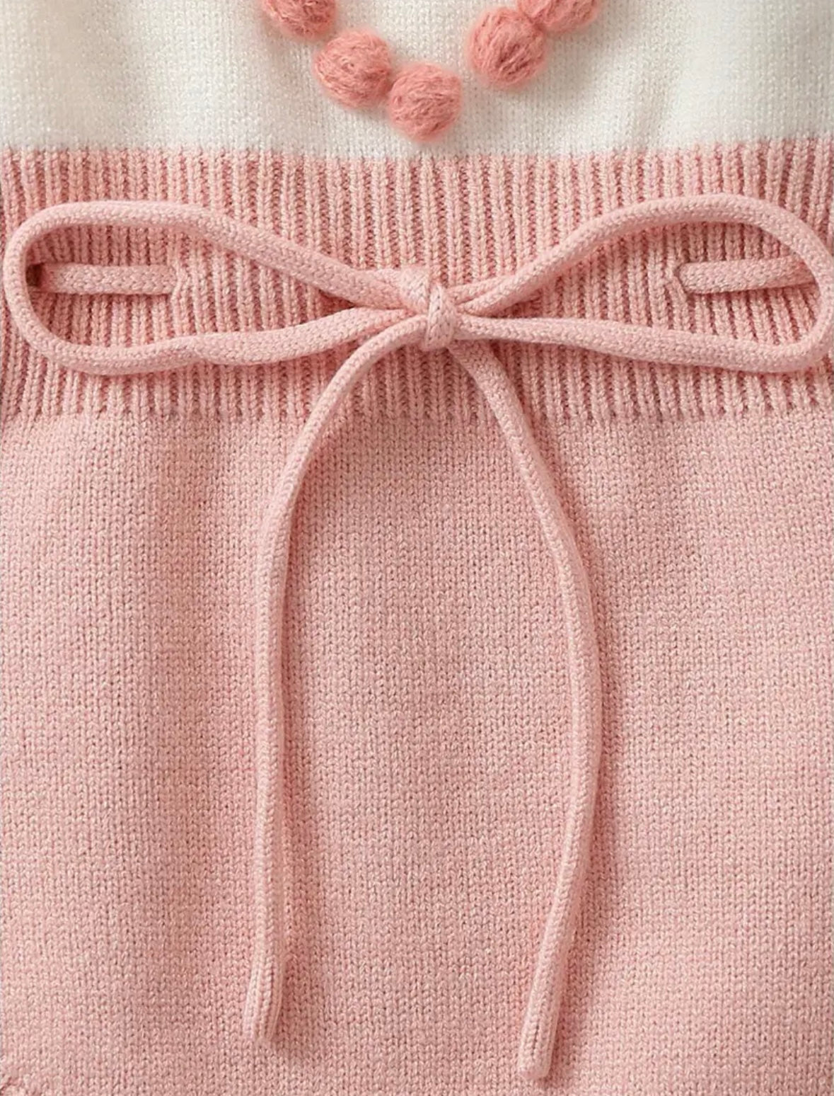 Pom-Pom Heart Knit Baby Romper – Blush & Cream. Available in sizes:  0-3m,  3-6m , and  9-12m
