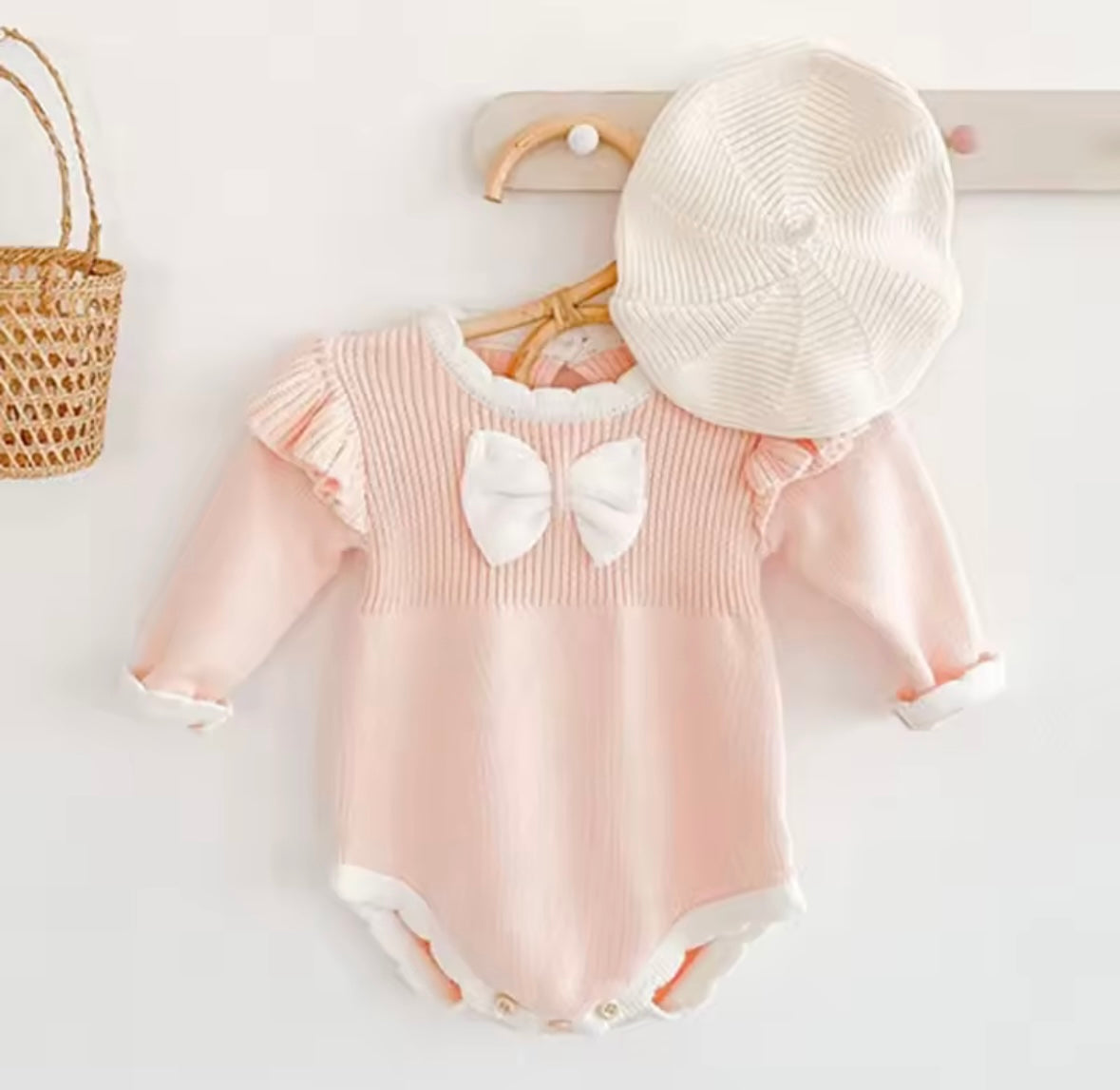 Blush Pink Knit Baby Romper with Ruffle Sleeves & Bow