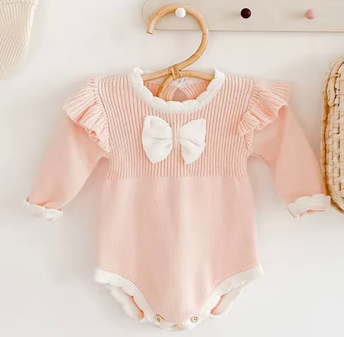 Blush Pink Knit Baby Romper with Ruffle Sleeves & Bow