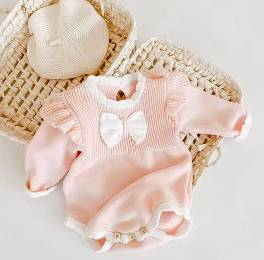 Blush Pink Knit Baby Romper with Ruffle Sleeves & Bow