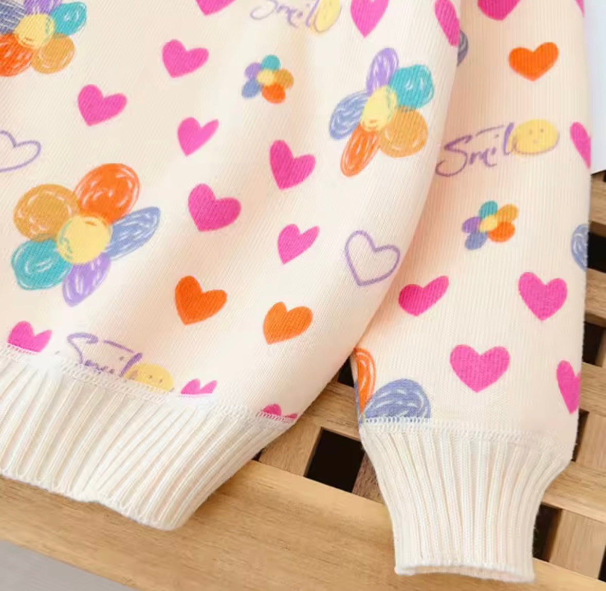 Smile & Hearts Pastel Flower Sweatshirt – Cozy & Cute