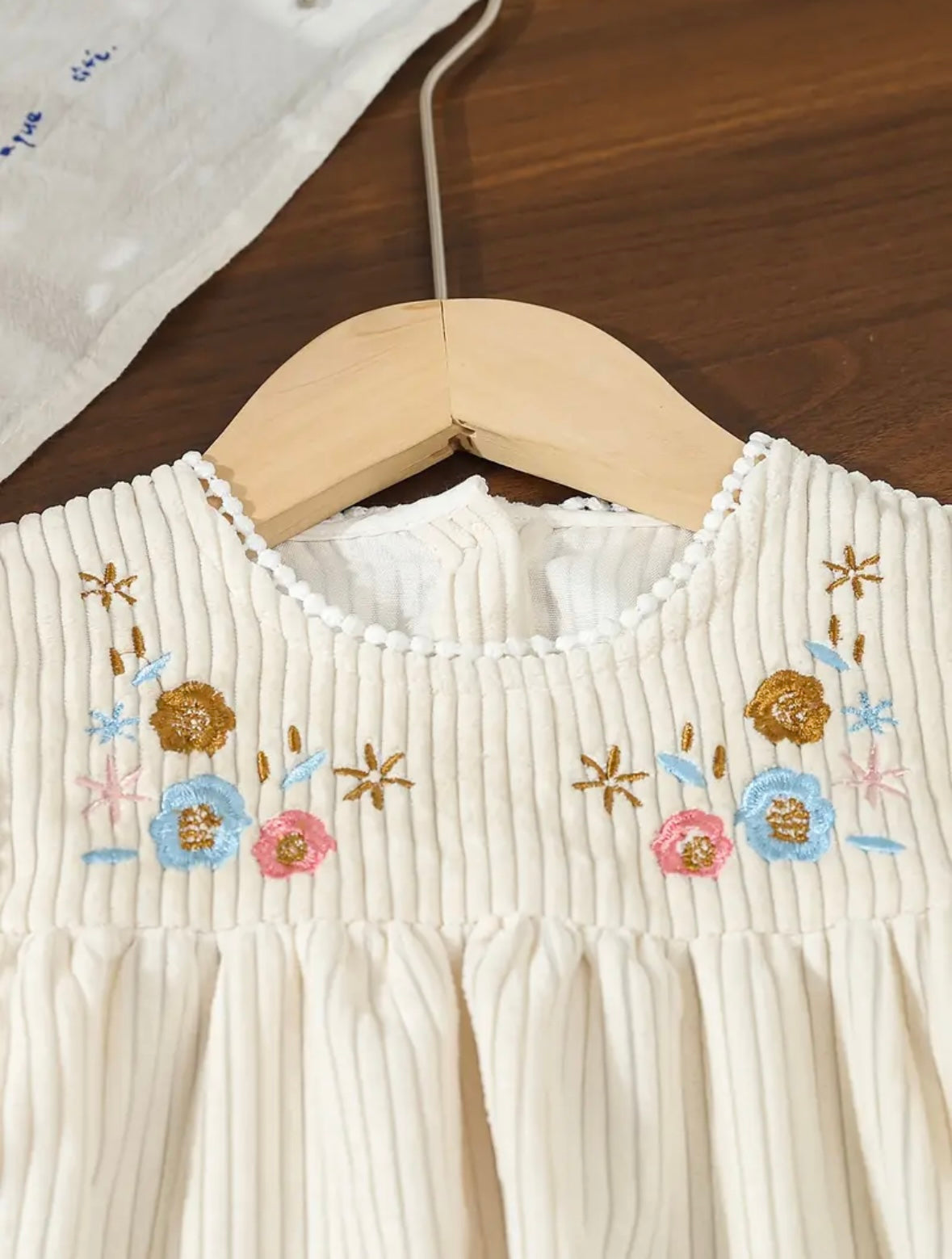 Embroidered Corduroy-Style Long Sleeve Dress – Cream, sizes available 18-24m, and size 2T.