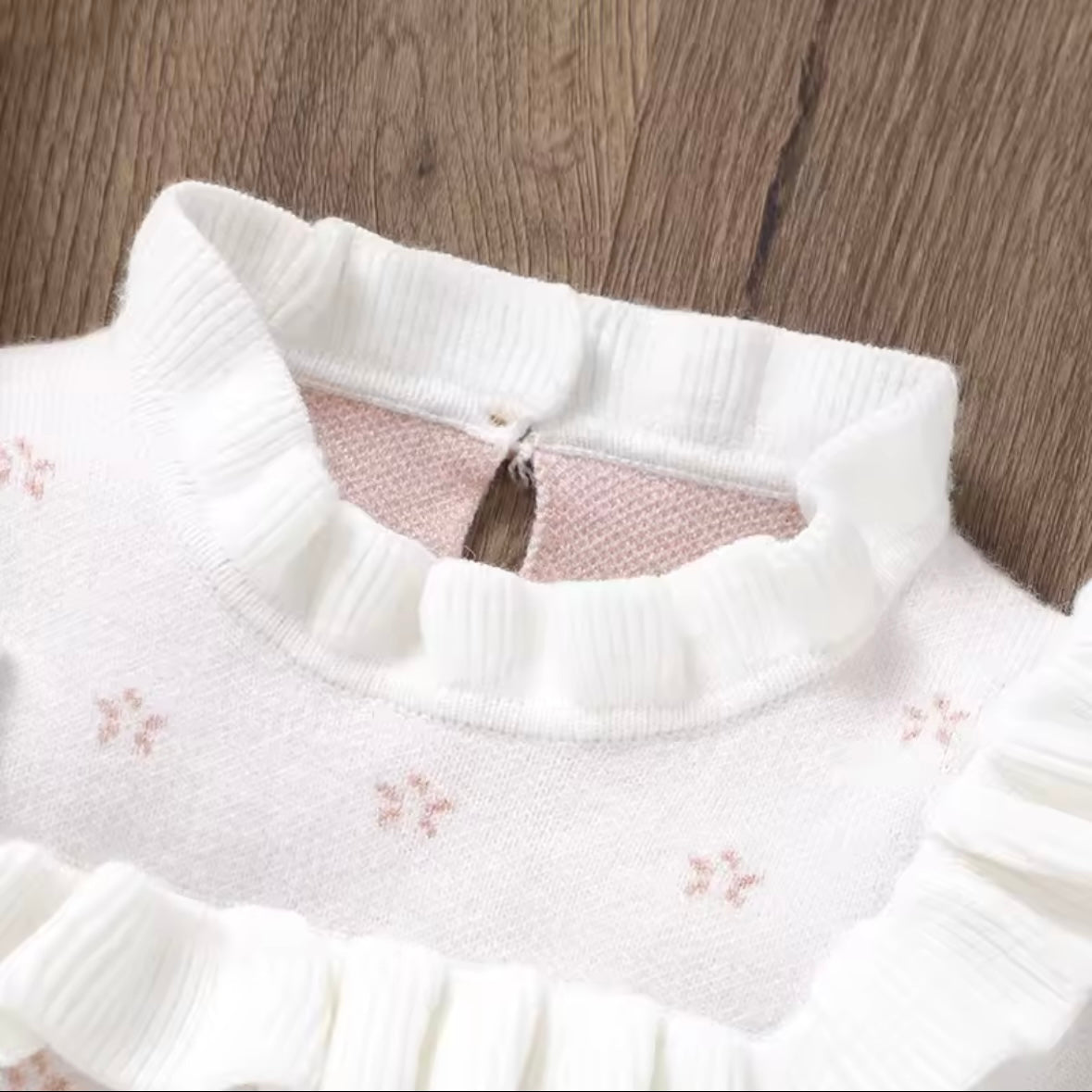 Knit White Ruffle Baby Romper with Tiny Floral Embroidery – Size 0-3m